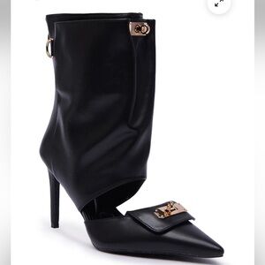 Elegant Black Pointed-Toe Stiletto Ankle Boot with Gold Hardware